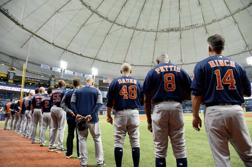 ST. PETERSBURG, FL - AUGUST 29:  Houston Astros stand for the National Anthem before their...
