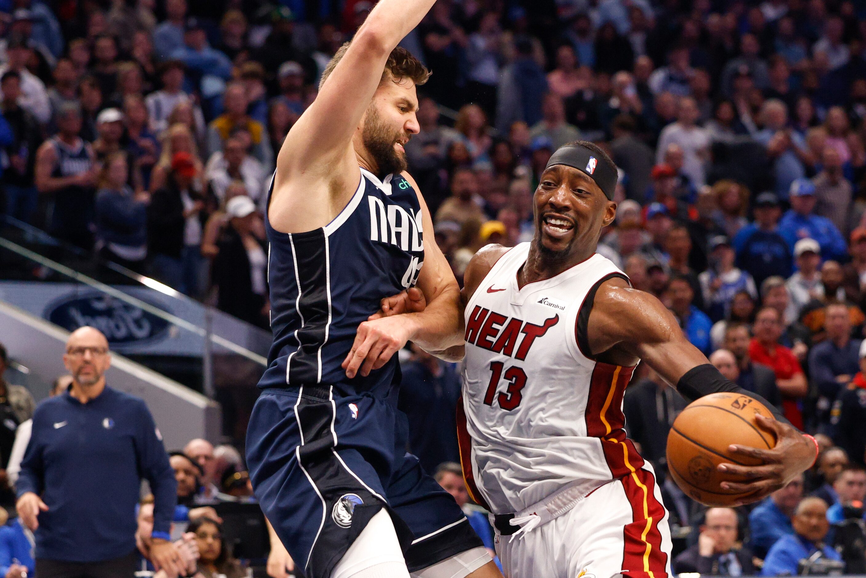 Dallas Mavericks forward Maxi Kleber (42) defends against Miami Heat center Bam Adebayo (13)...