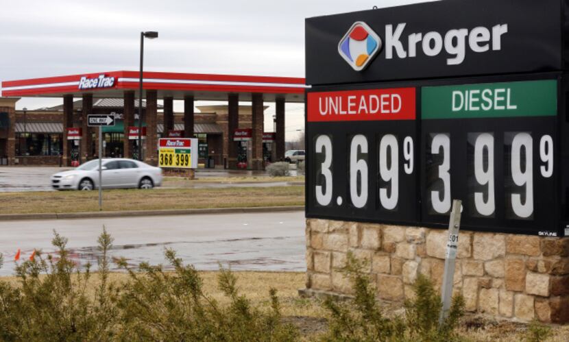 Kroger and RaceTrac  advertised their fuel prices Wednesday on Broad Street in Mansfield.