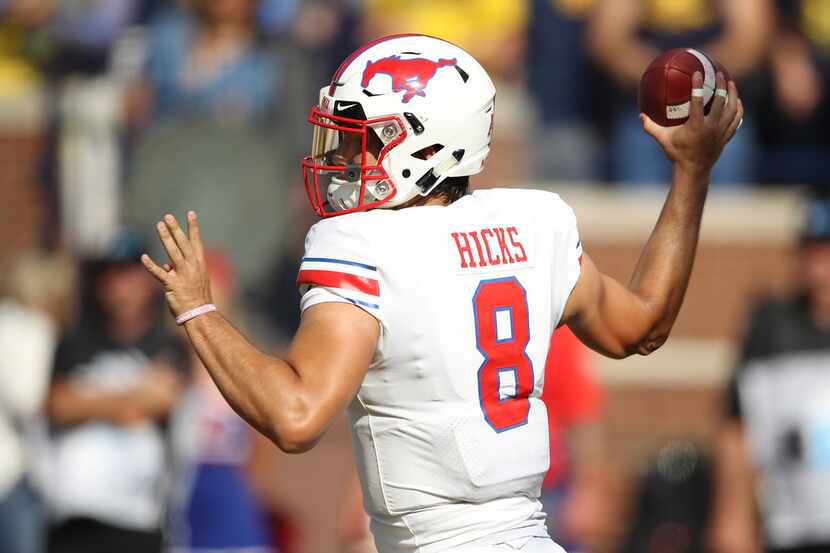 ANN ARBOR, MI - SEPTEMBER 15: Ben Hicks #8 of the Southern Methodist Mustangs throws a first...
