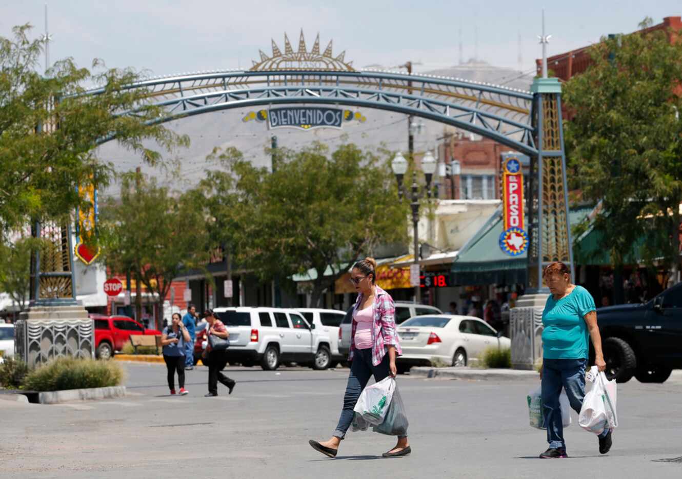 Alejandra Soto, left, and Rosa Sandoval, right, made their way back to Mexico after shopping...