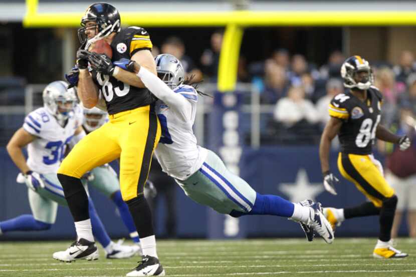 Dallas Cowboys strong safety Danny McCray (40) makes a diving tackle of Pittsburgh Steelers...