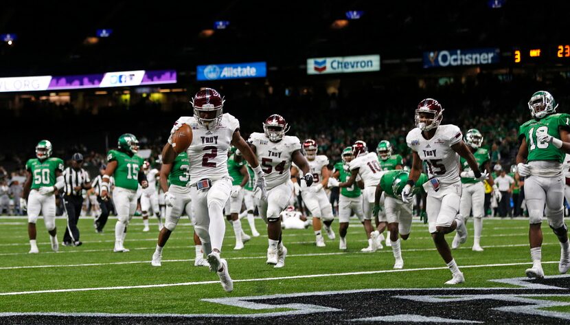 Troy wide receiver John Johnson (2) crosses into the end zone for a touchdown in the second...