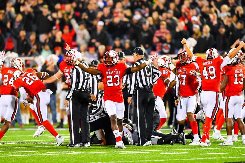 FILE - Texas Tech defensive back DaMarcus Fields (23) reacts to an onside kick recovery...