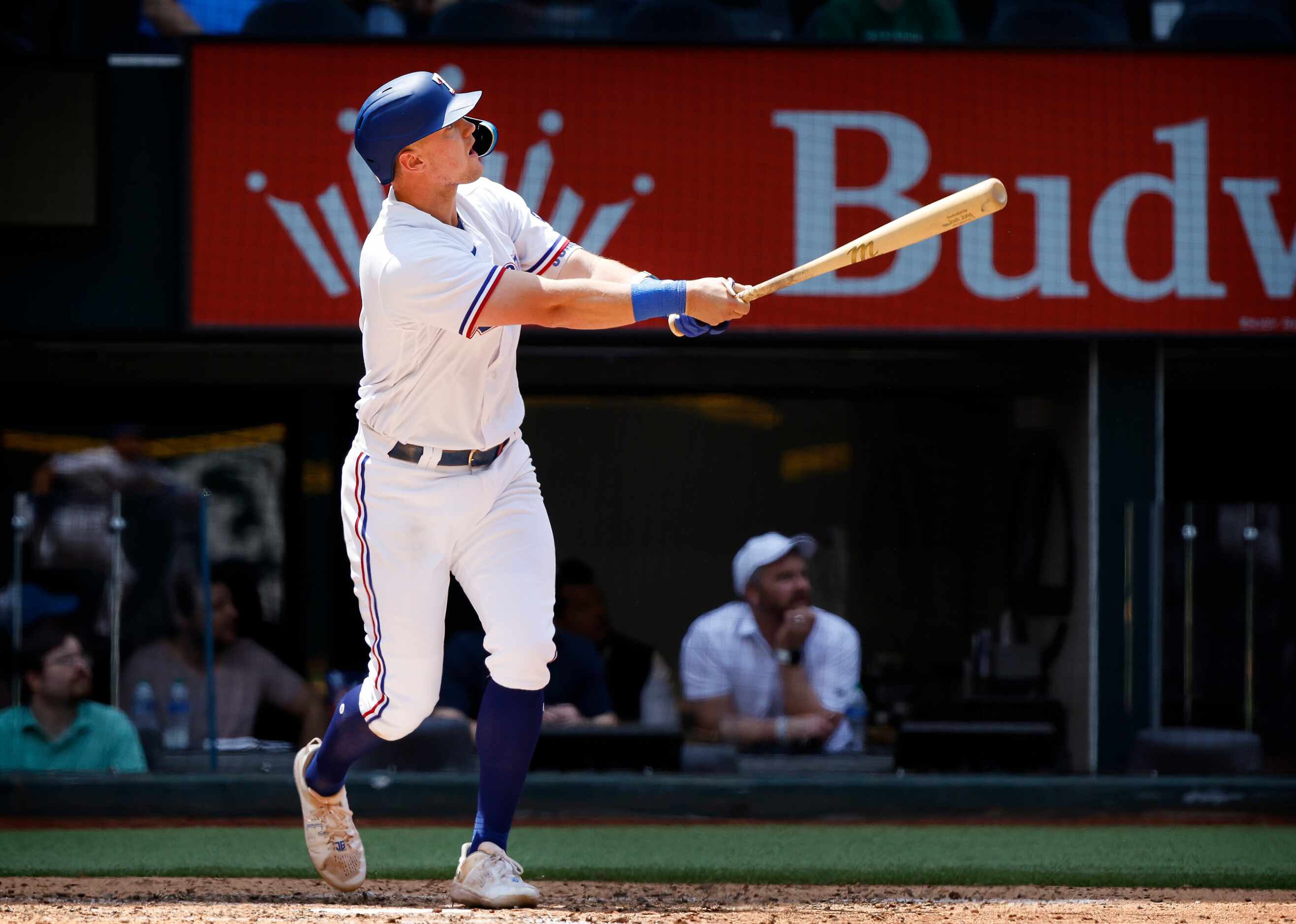 Texas Rangers third baseman Josh Jung (6) watches his two-run homer during the fifth inning...