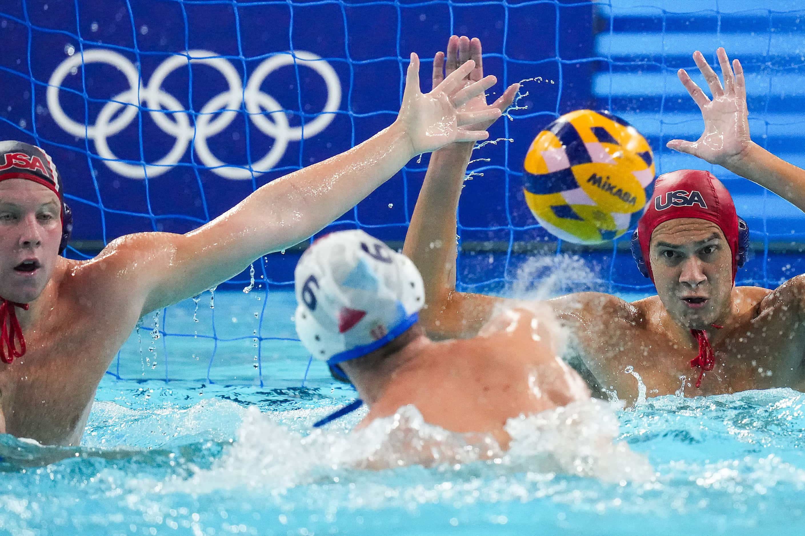 Nikola Dedovic (6) of Serbia scores past goalkeeper  Adrian Weinberg of the United States...