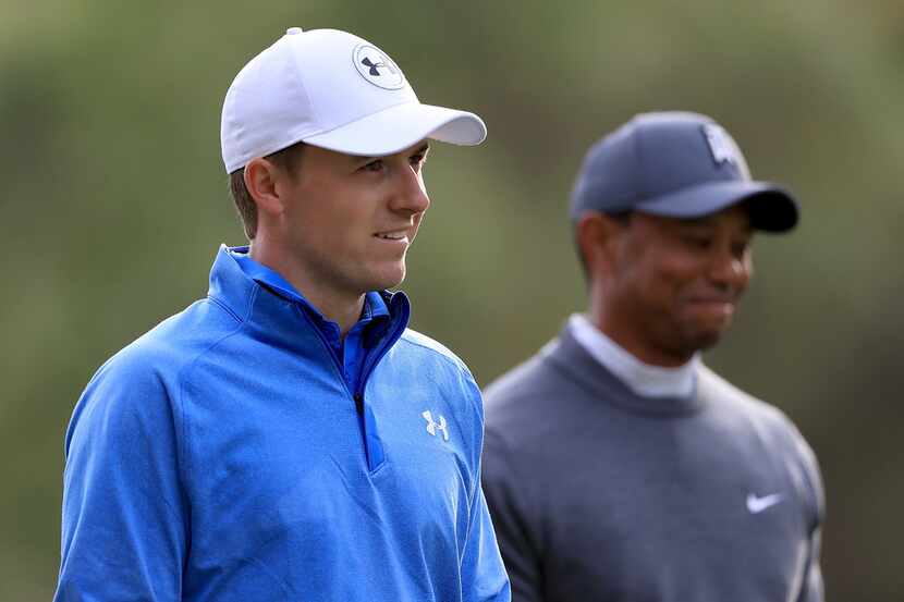 PALM HARBOR, FL - MARCH 08: Jordan Spieth (L) walks with Tiger Woods on the 17th hole during...