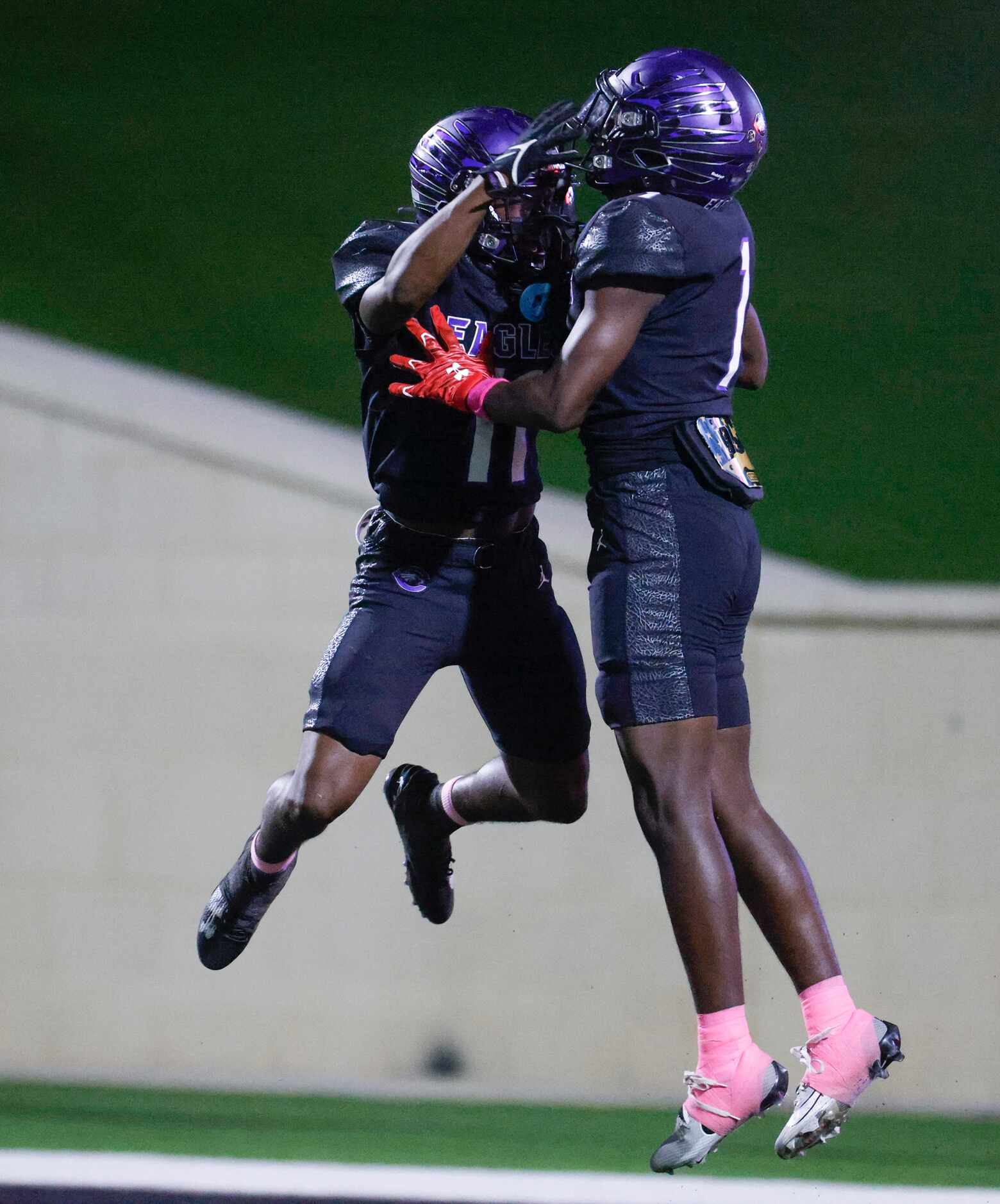 Crowley High’s Curtis Johnson (left) and Antayvious Ellis celebrate after a touchdown...