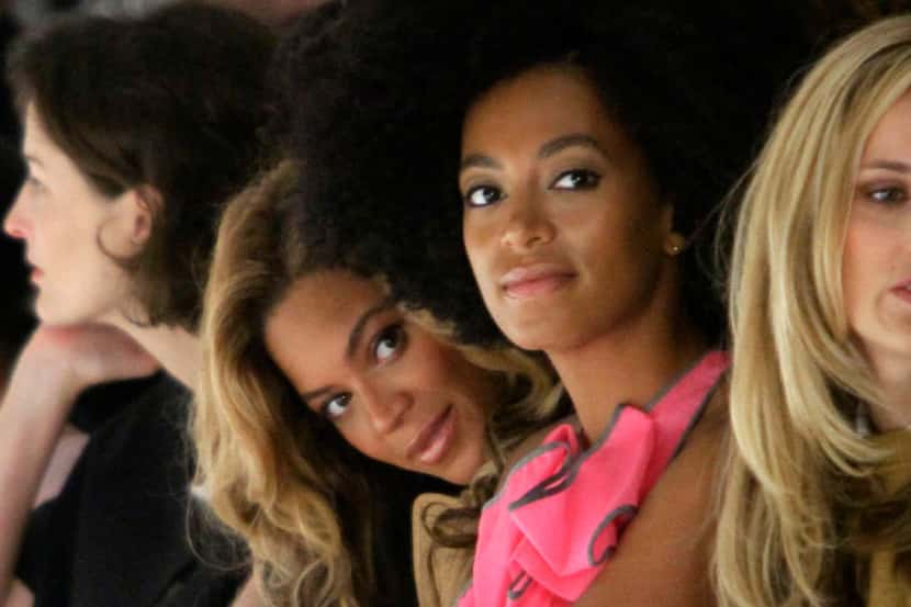 FILE - In this Sept. 13, 2011, file photo, Beyonce Knowles, center left, sits with her...