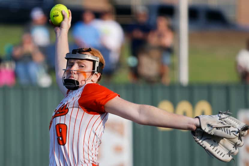 Rockwall’s Ainsley Pemberton pitches during the fifth inning of a softball game against...