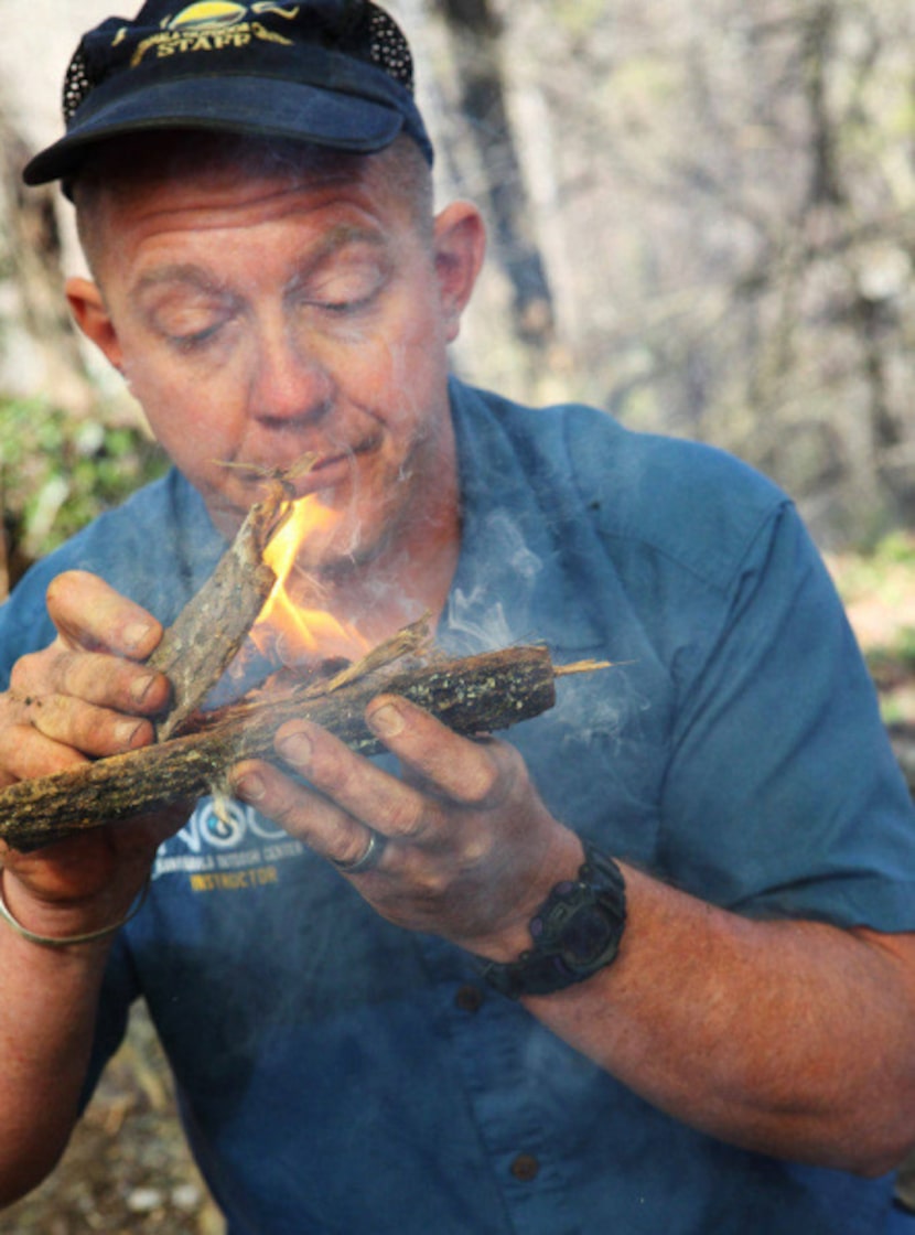 Jason Drevenak, manager of the Nantahala Outdoor Center's Wilderness Survival School, shows...