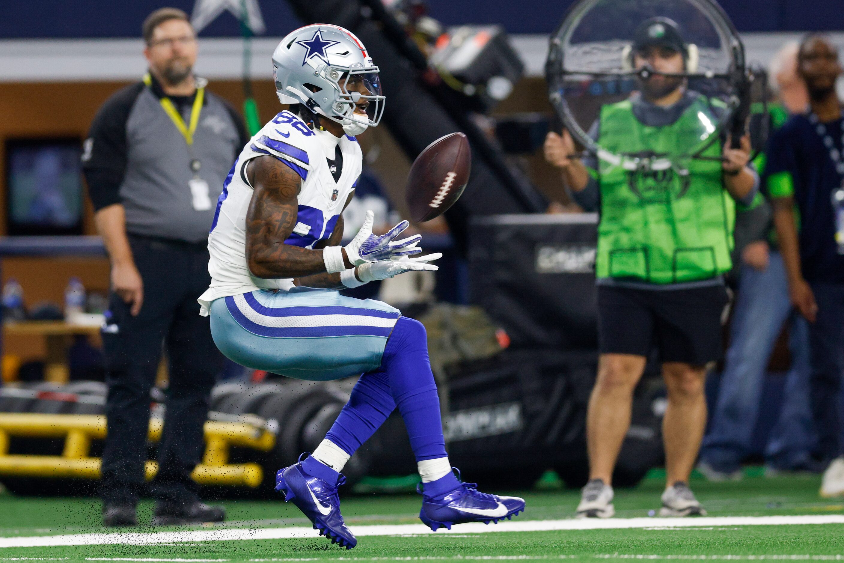 Dallas Cowboys wide receiver CeeDee Lamb (88) catches a pass from quarterback Dak Prescott...