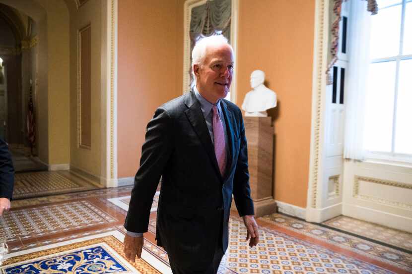 FILE â Sen. John Cornyn (R-Texas) walks to the Senate Floor for a vote on Capitol Hill in...