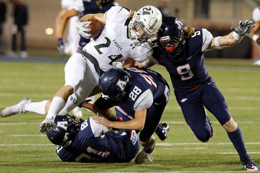 Allen High School wide receiver Deysean Wynter (81) Allen High School kicker James Griffith...