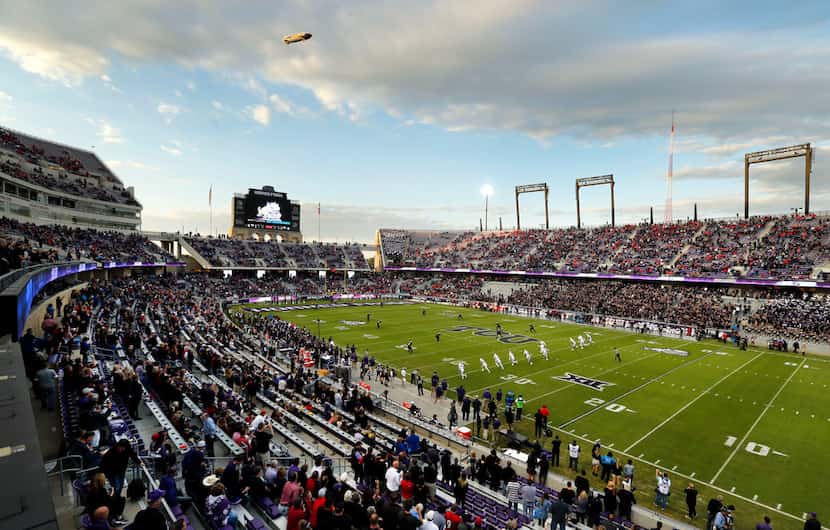 The Goodyear blimp hovers near Amon G. Carter Stadium in Fort Worth as the Texas Tech Red...