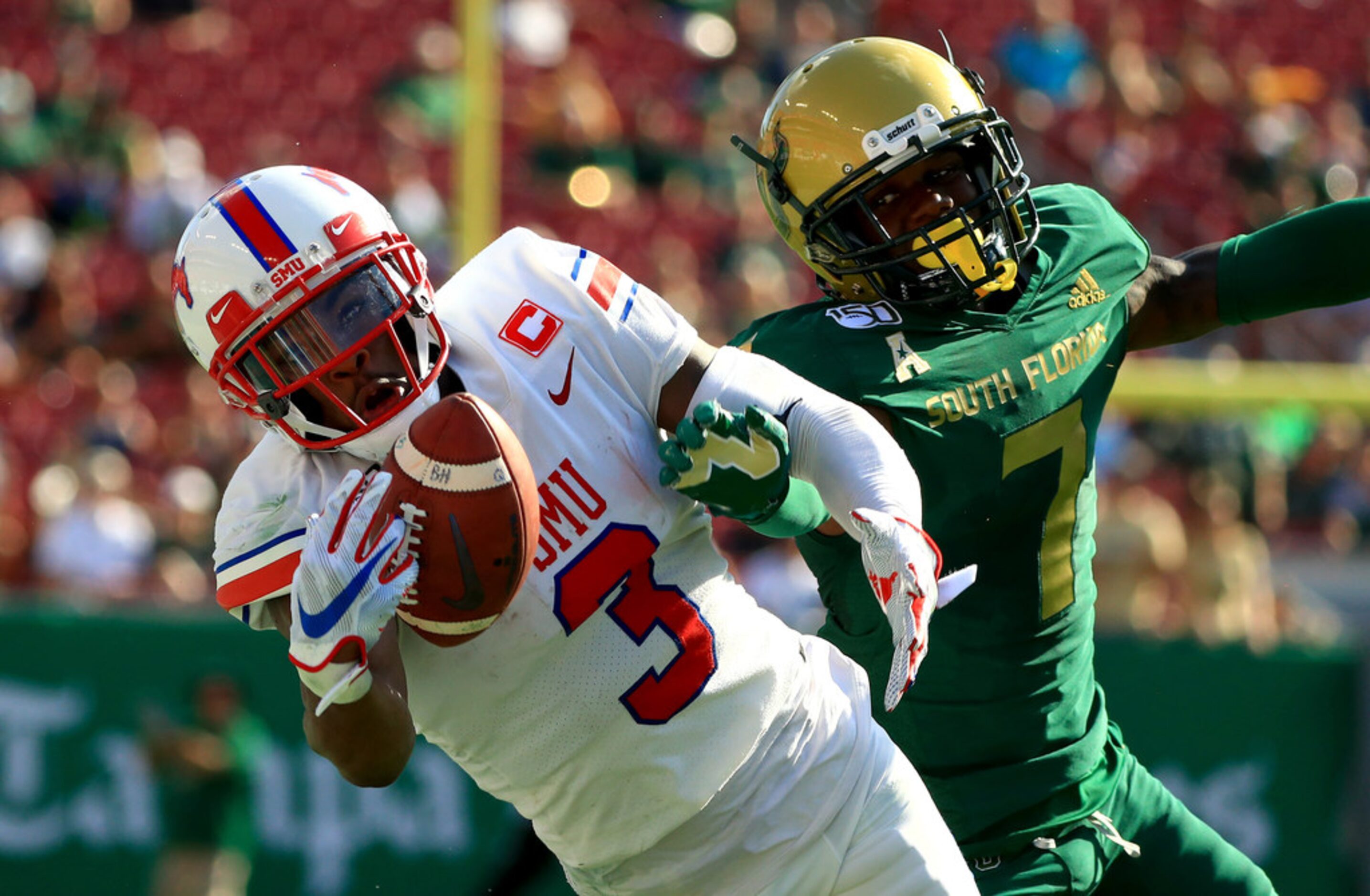 TAMPA, FLORIDA - SEPTEMBER 28: James Proche #3 of the Southern Methodist Mustangs makes a...