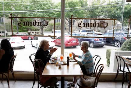 Linda Reynolds (left) and Marilyn Watson eat at Carbone's Fine Food & Wine in Dallas. The...