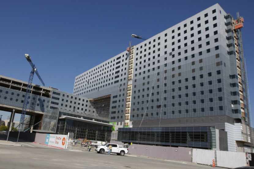 The new Parkland Memorial Hospital, under construction, is prohibited by state law from...