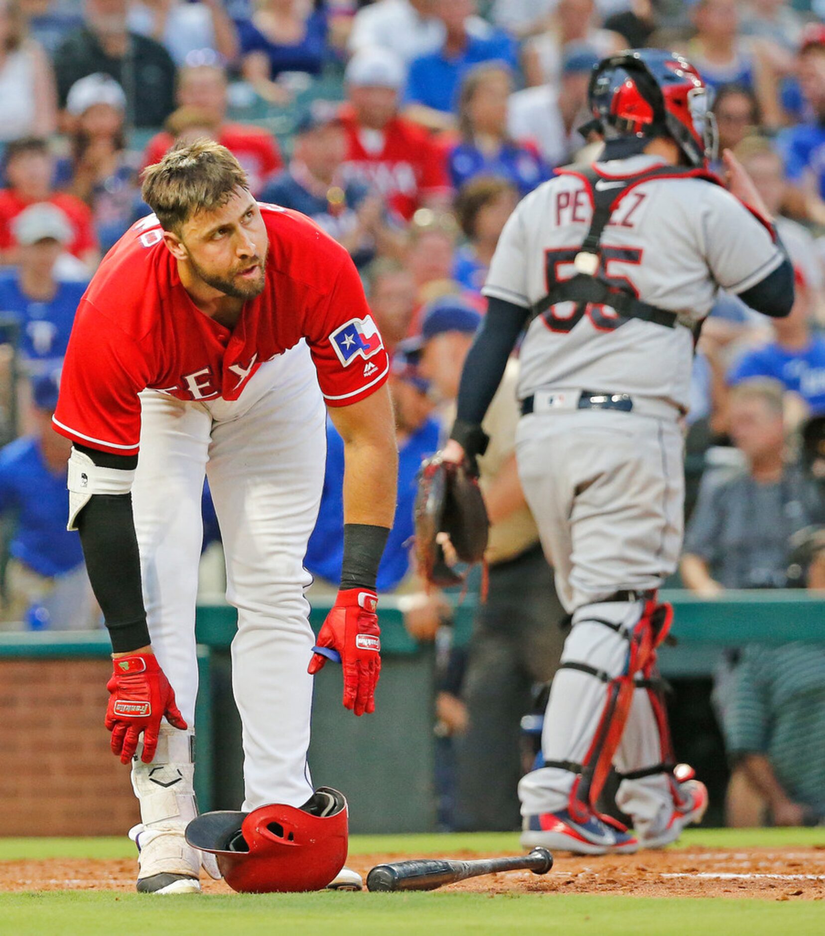 Texas Rangers Joey Gallo (13) puts his hitting gear on the ground after striking out to end...