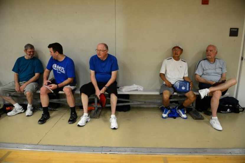 
Pickleball players take a rest in between sets at the Rowlett Community Centre. 
