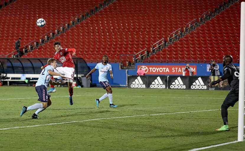 Ricardo Pepi rises up for a header that resulted in his 2nd goal of the night against...