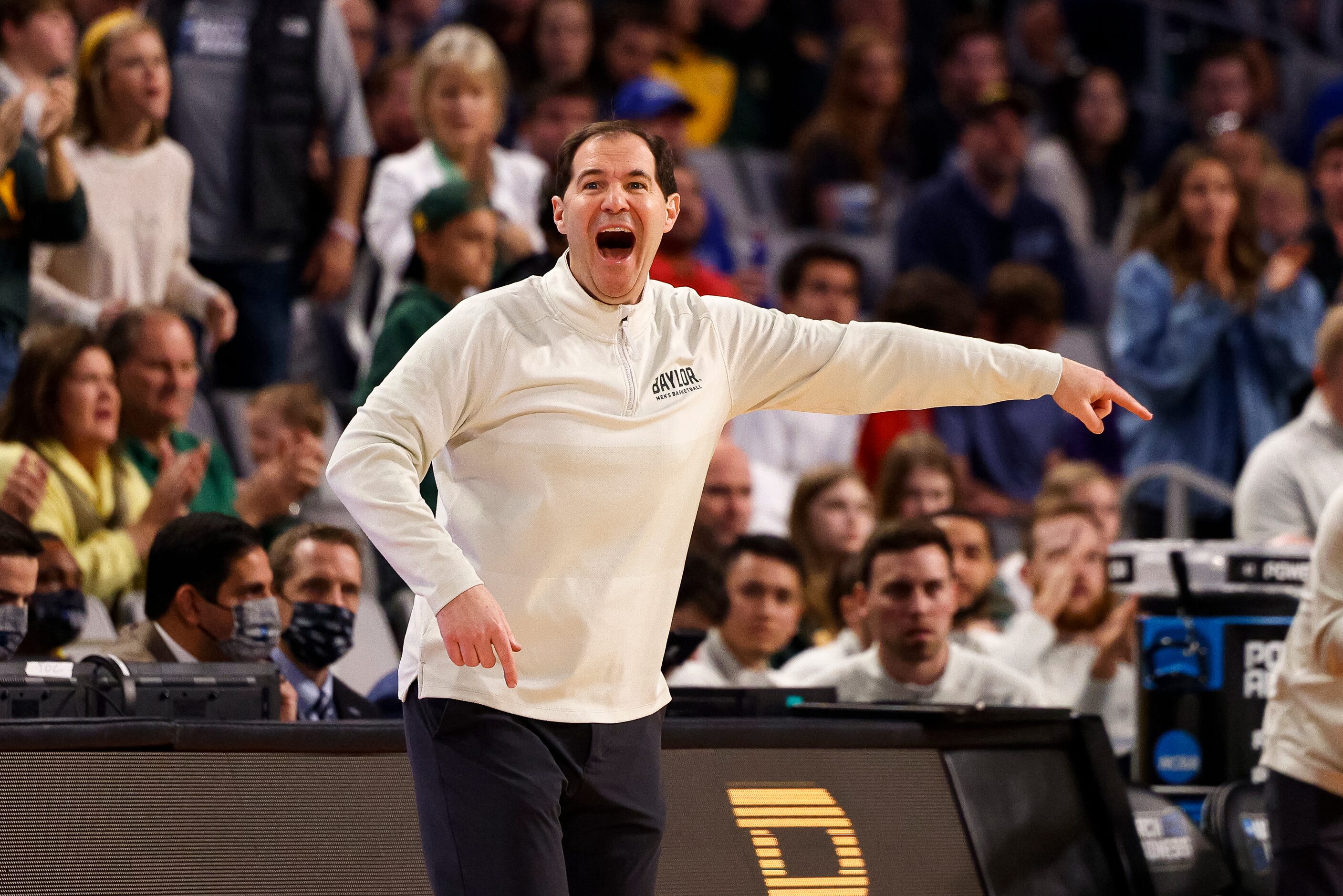 Baylor Bears head coach Scott Drew signals to his team during the second half of a second...