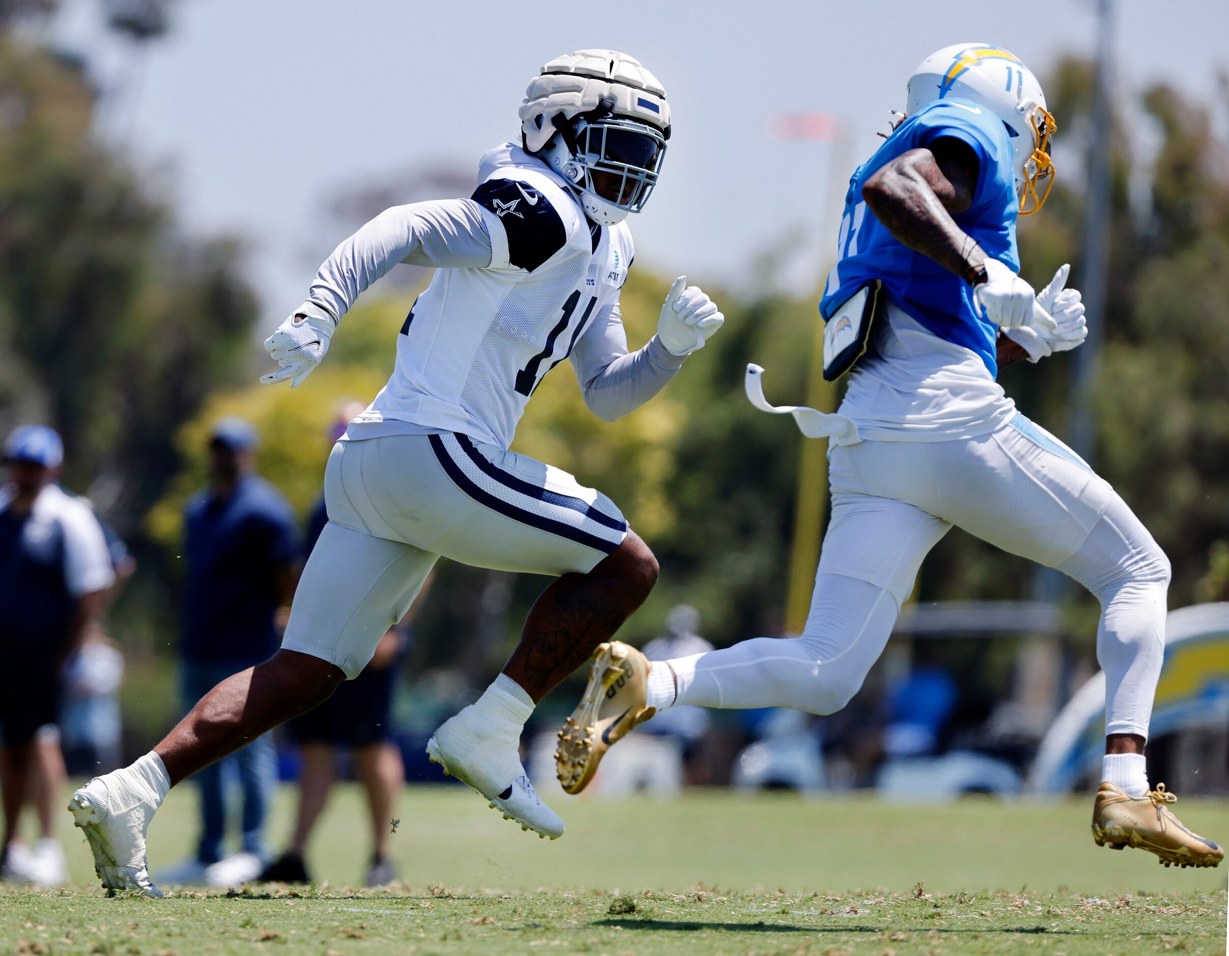 Dallas Cowboys linebacker Micah Parsons (11) covers Los Angeles Chargers wide receiver Jason...