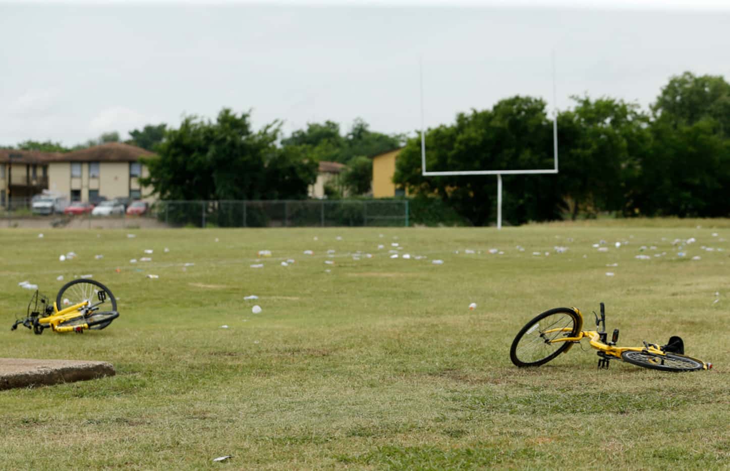 Bikes and debris on the football field at the Juanita Craft Recreation Center in Dallas.