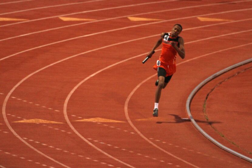 Lancaster's Eric Age is all alone as he runs his leg of the boys 4 x 400 relay in which...