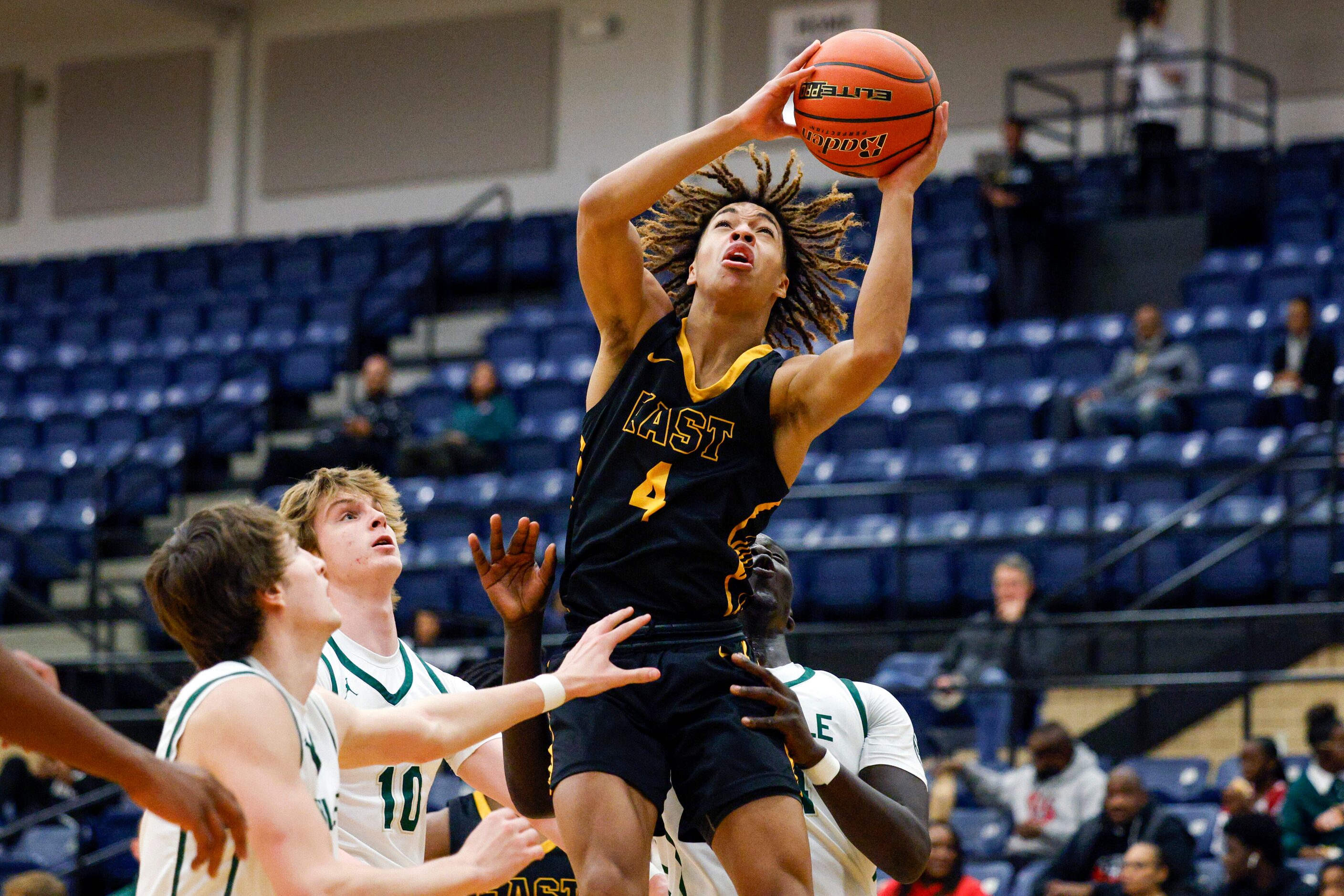 Plano East guard Jordan Mizell (4) elevates for a layup during the first half of a...