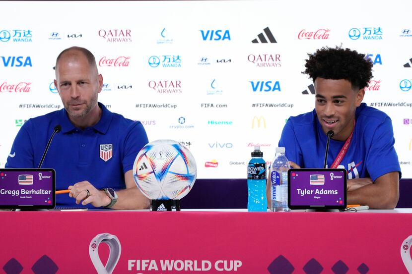 Head coach Gregg Berhalter, left, and Tyler Adams, both of the United States, attend a press...