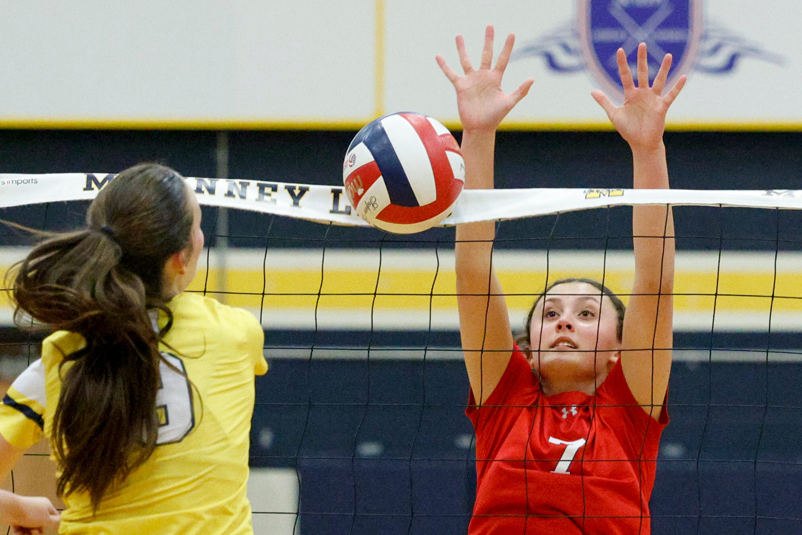 McKinney’s Olivia Cohee (9) hits a shot into the net against McKinney Boyd’s Sara Quigley...