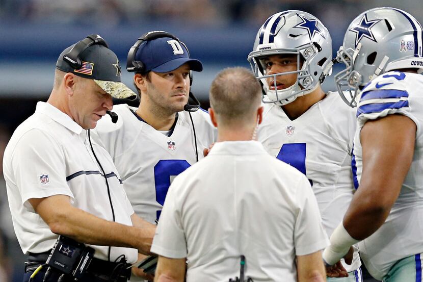 (From left) Dallas Cowboys offensive coordinator Scott Linehan, backup quarterback Tony Romo...