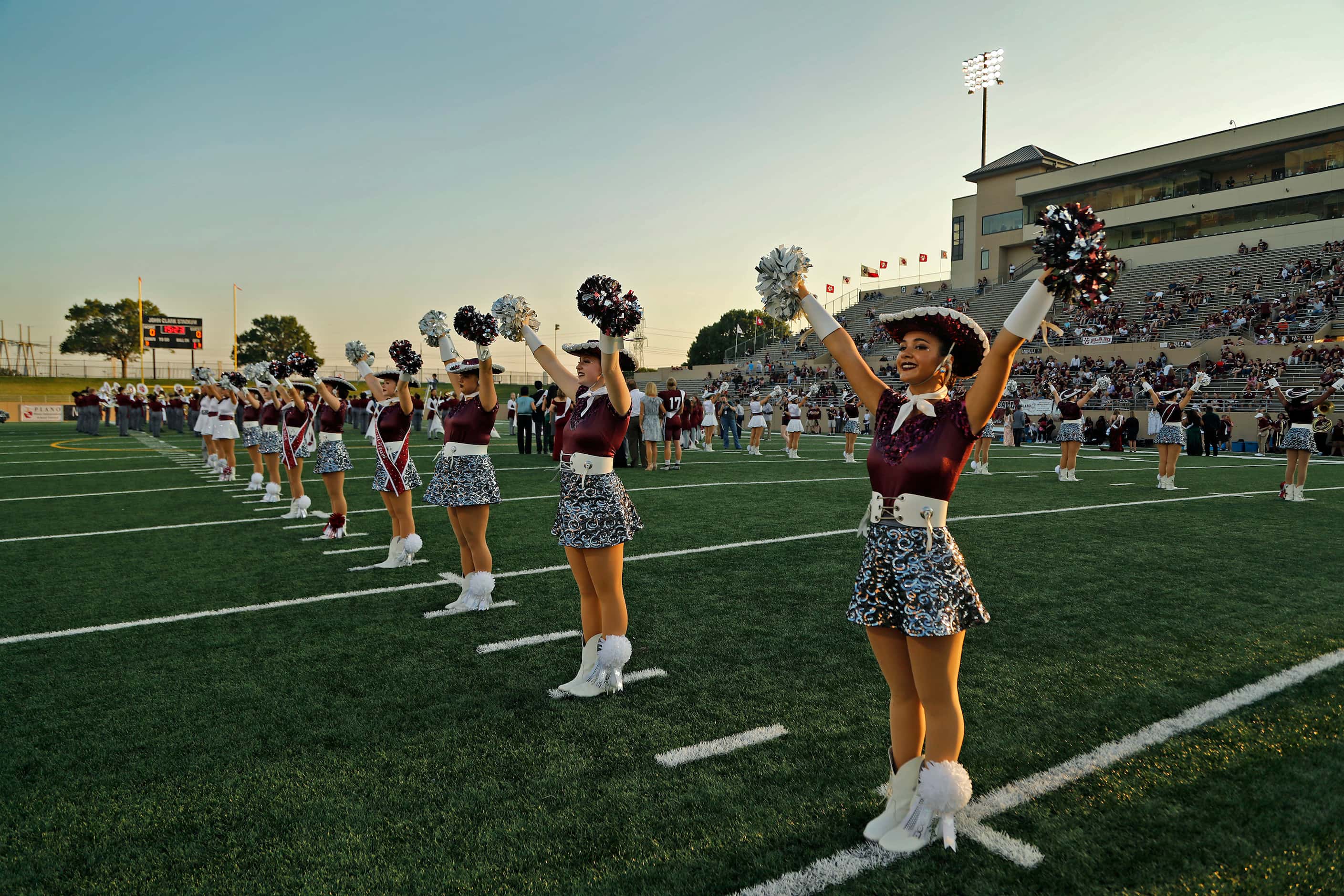 Planoette Cameron Toliver, 17, performs before the kickoff as Plano High School hosted Plano...