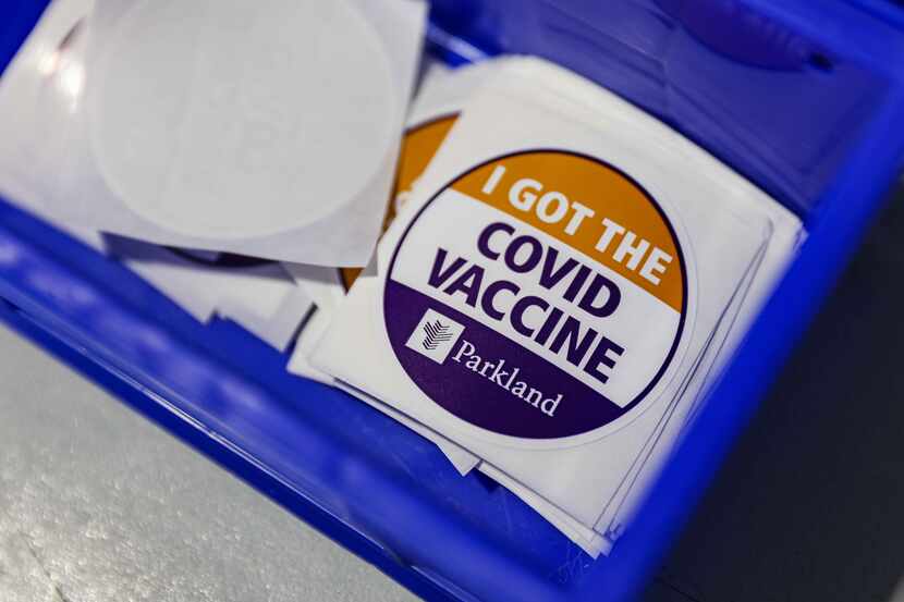 COVID vaccine stickers where the Pfizer-BioNTech COVID-19 vaccine is administed at Ellis...