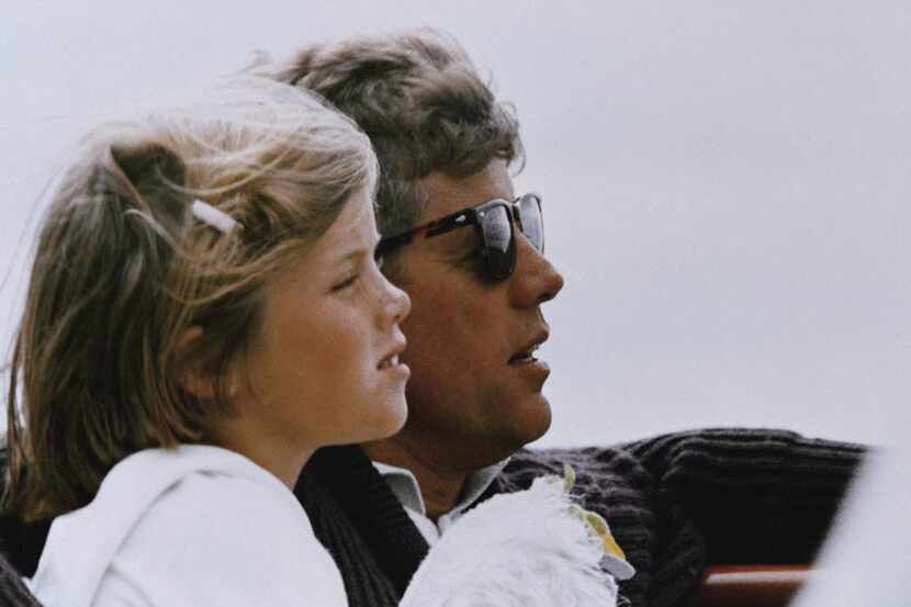 In this 1962 file photo, President John F. Kennedy and his daughter, Caroline, sail off...
