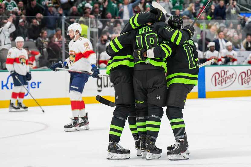Dallas Stars left wing Michael Raffl (18) celebrates a goal with teammates during the first...