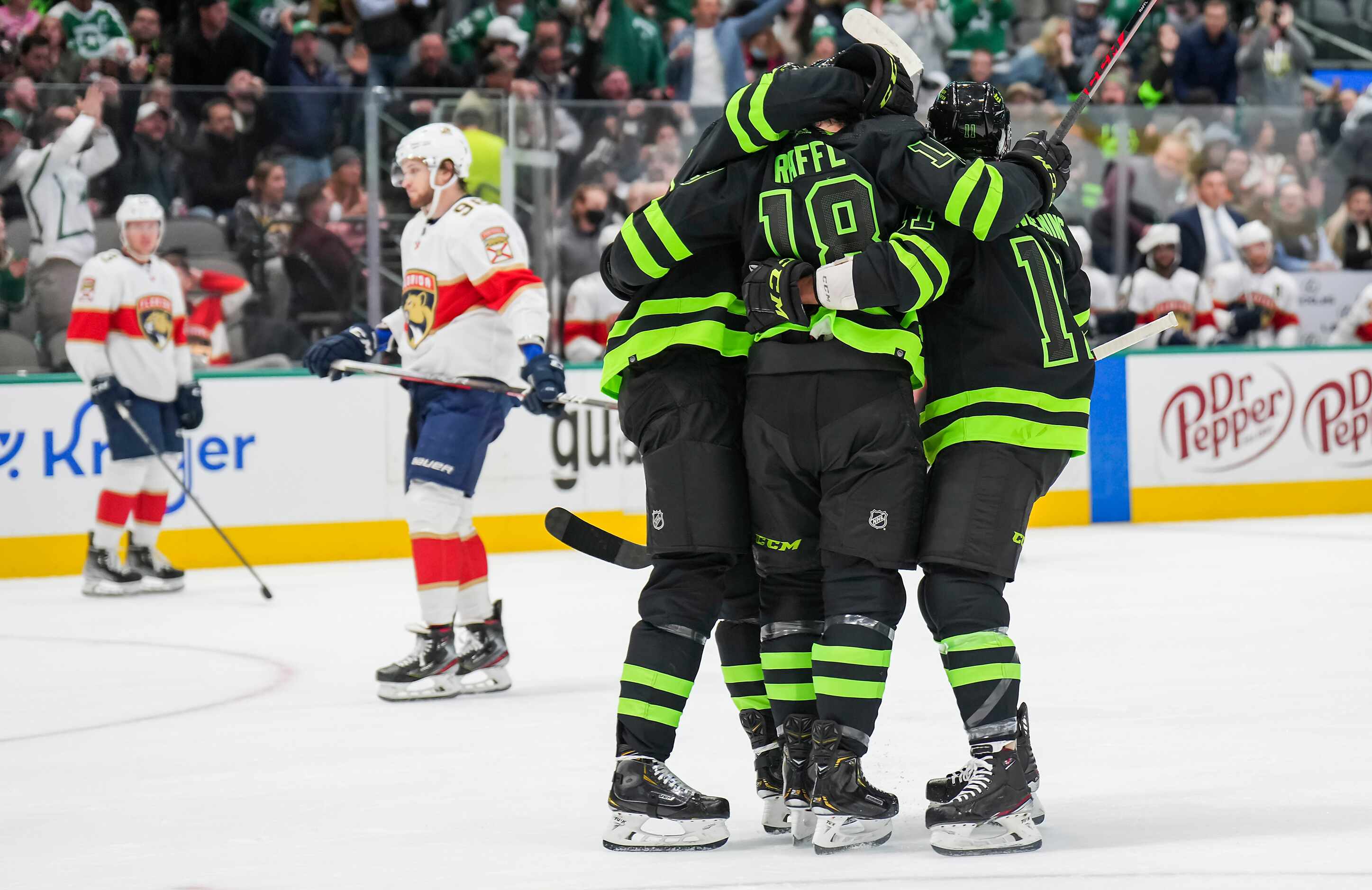 Dallas Stars left wing Michael Raffl (18) celebrates a goal with teammates during the first...