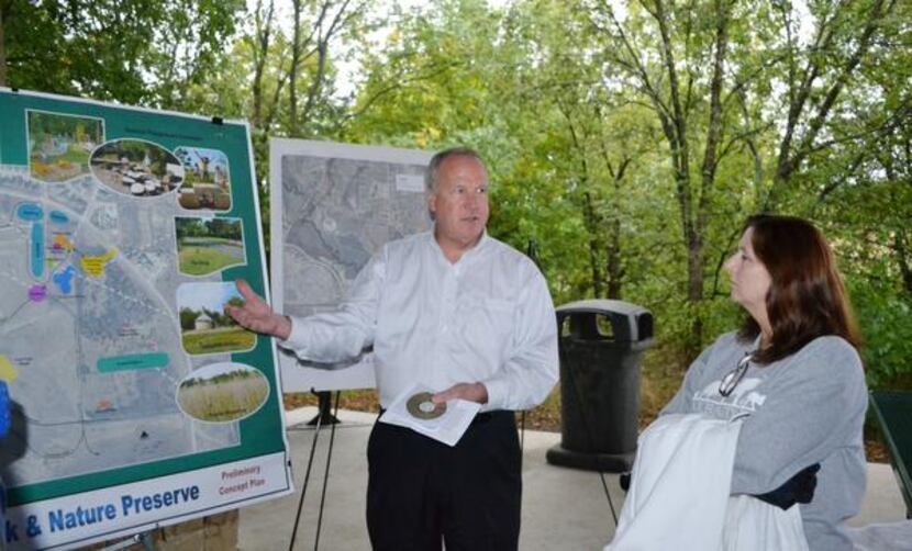 Robin Reeves (left), chief park planner for the city of Plano, discusses plans and updates...