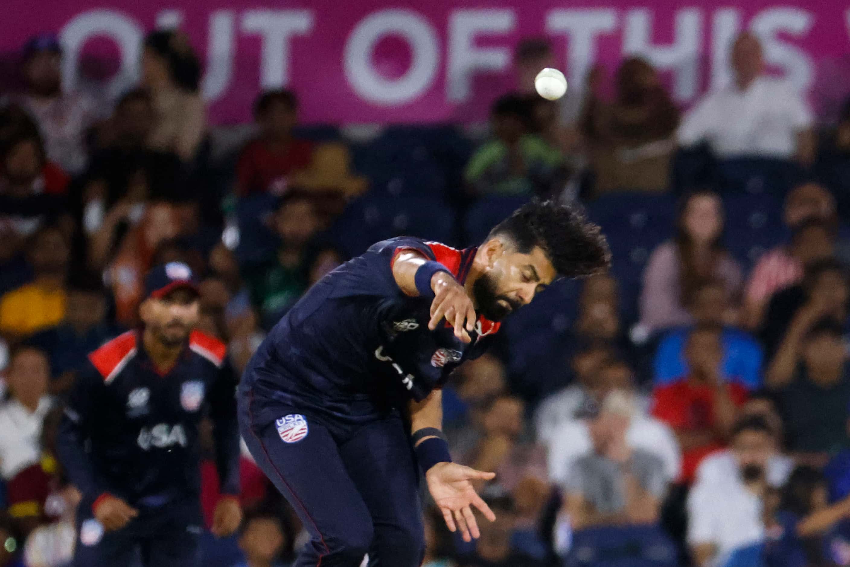 United States' Muhammad Ali-Khan bowls during the men's T20 World Cup cricket match against...