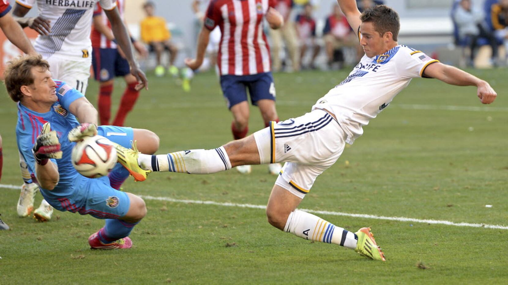 Jun 8, 2014; Carson, CA, USA; Chivas USA goalkeeper Dan Kennedy (1) blocks a kick on goal in...