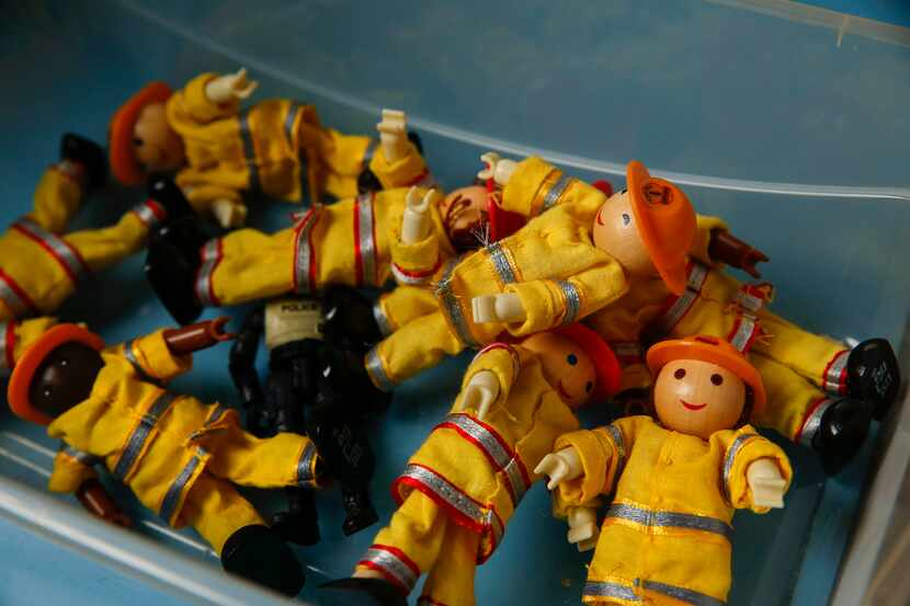 Firefighter dolls in a therapy play room at Momentous Institute in Dallas.