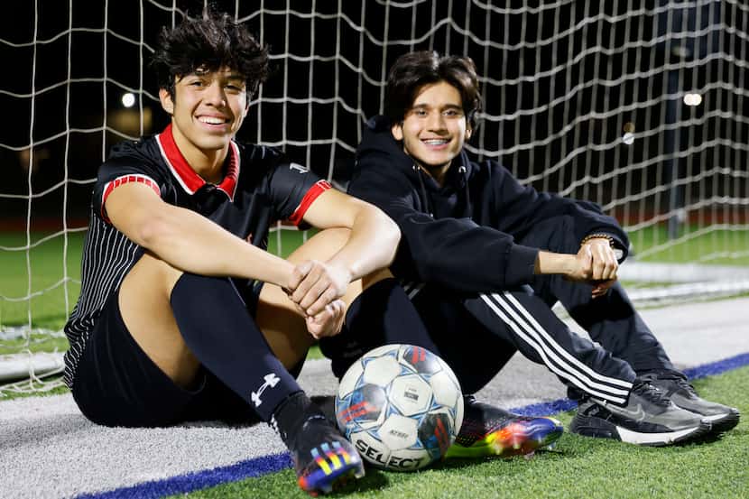 James Martin High School midfielder Joel Romero (left) poses for a photo with his cousin and...