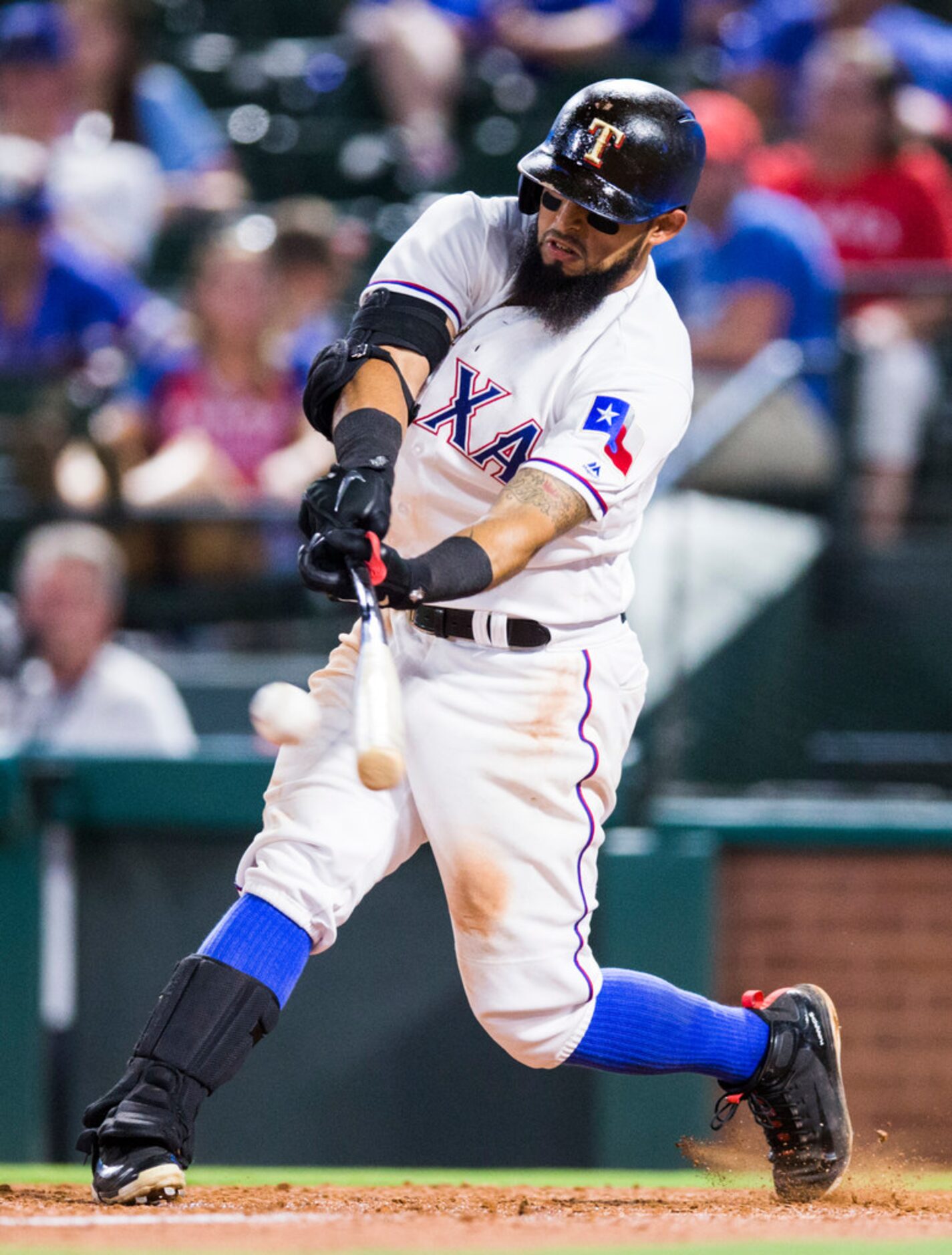 Texas Rangers second baseman Rougned Odor (12) bats during the eighth inning of an MLB game...