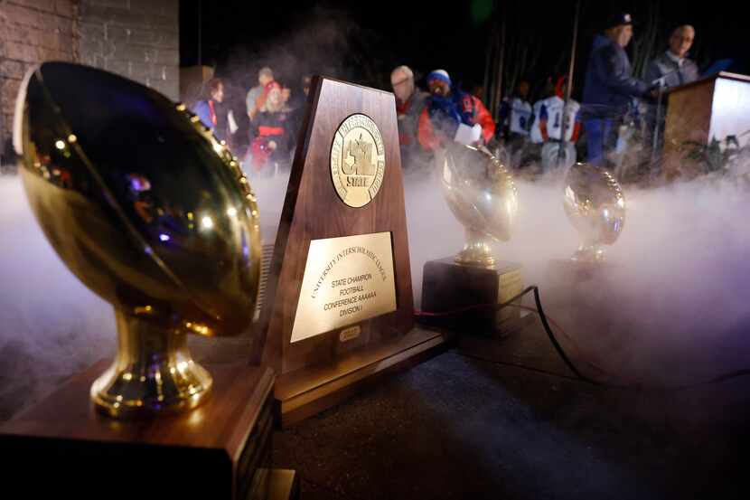 Artificial fog gathers around the trophies earned along the way to the 2022 6A Division I...