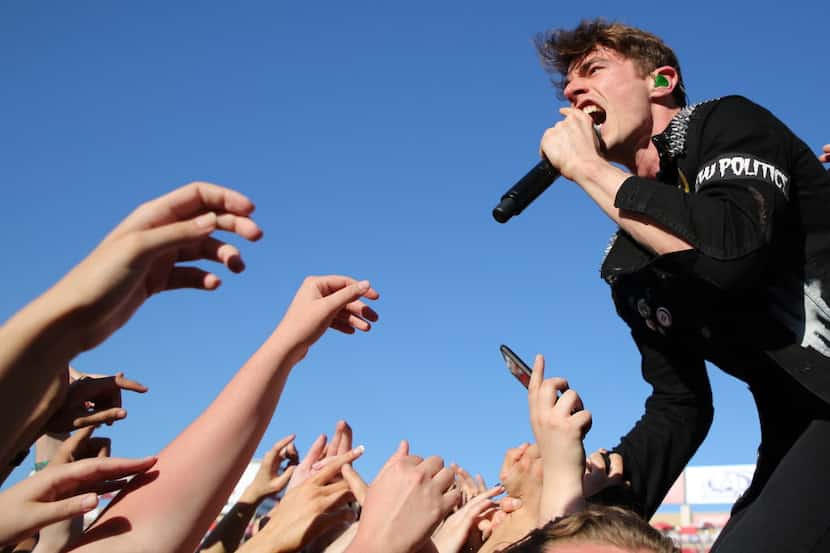 Jumping into a crowd, David Boyd of New Politics performs at Edgefest at Toyota Stadium on...