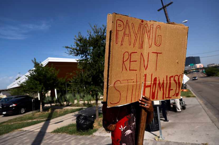 David Andrews protested July 27, 2021, outside The Cottages at Hickory Crossing where he...