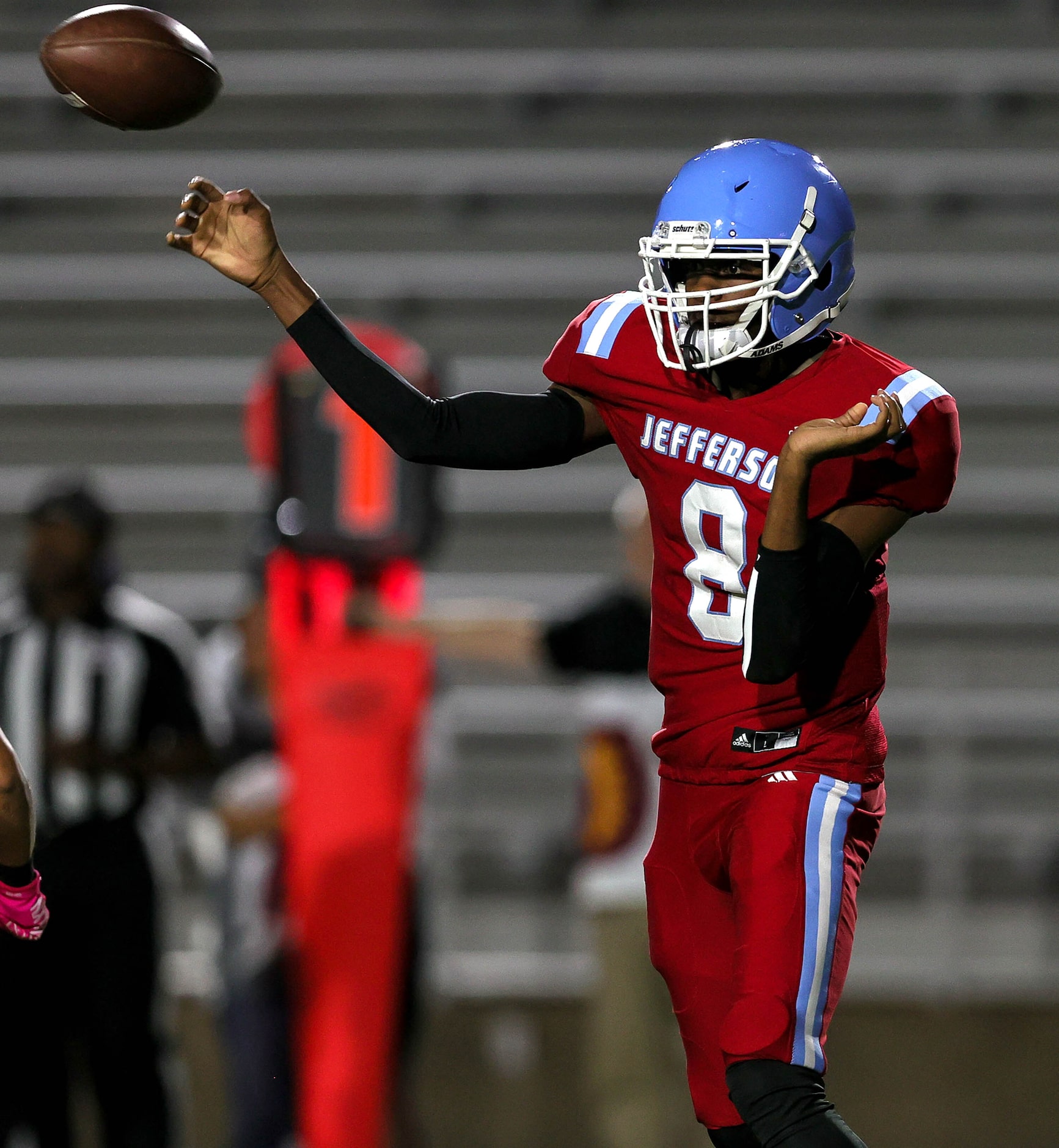 Thomas Jefferson quarterback Jayaveon Brown attempts a pass against Seagoville during the...