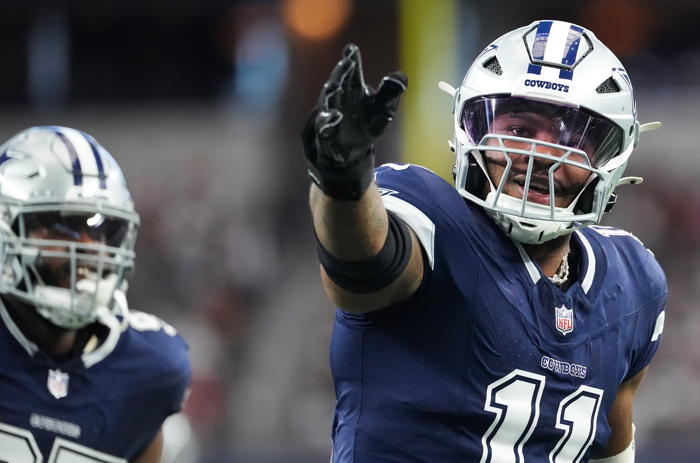 Dallas Cowboys linebacker Micah Parsons celebrates after sacking Washington Commanders...