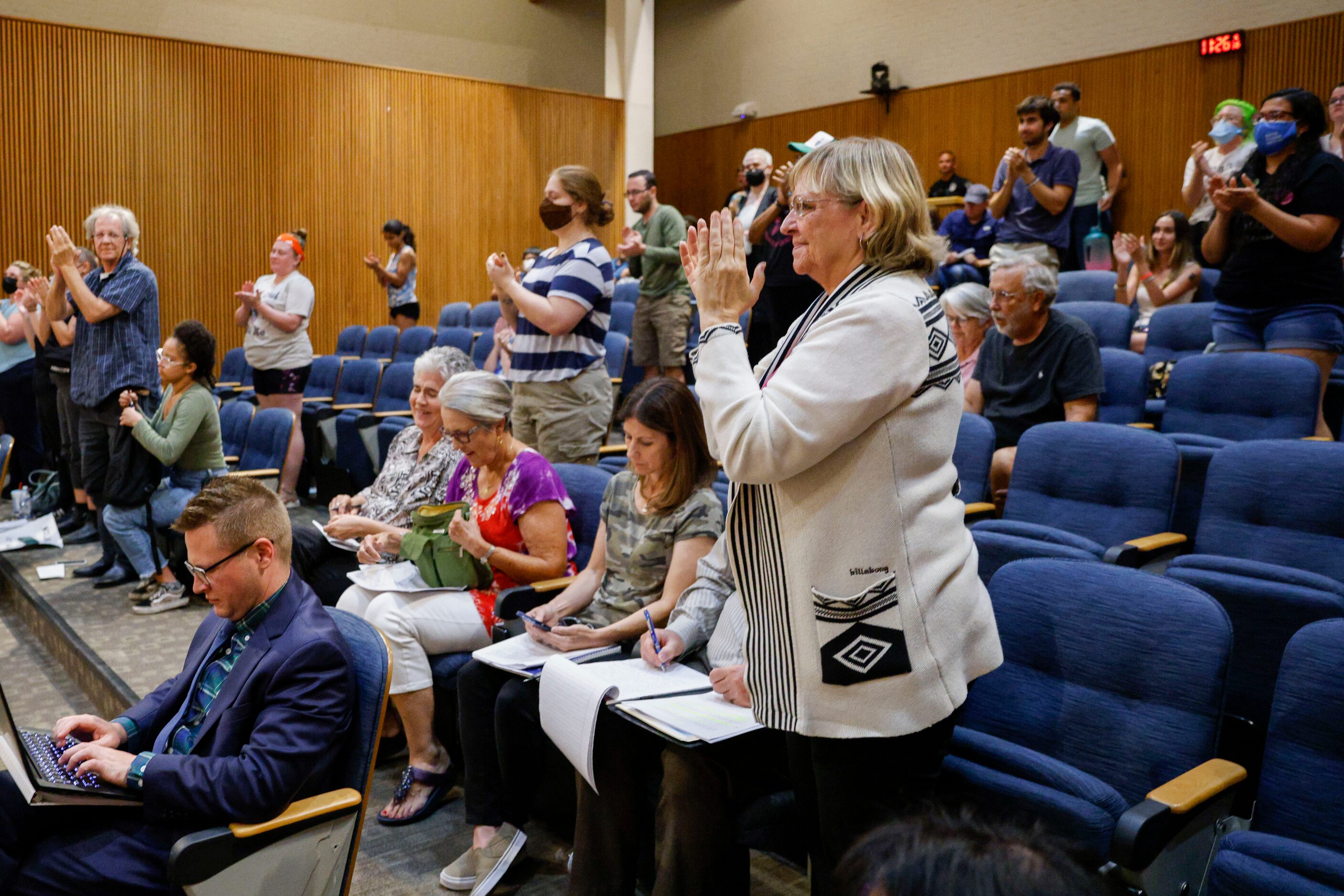 Abortion-rights supporters celebrate after a resolution to de-prioritize Texas abortion laws...